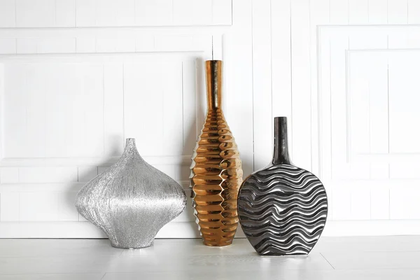 Vases on wooden background — Stock Photo, Image