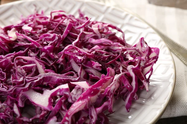 Red cabbage salad served on plate — Stock Photo, Image