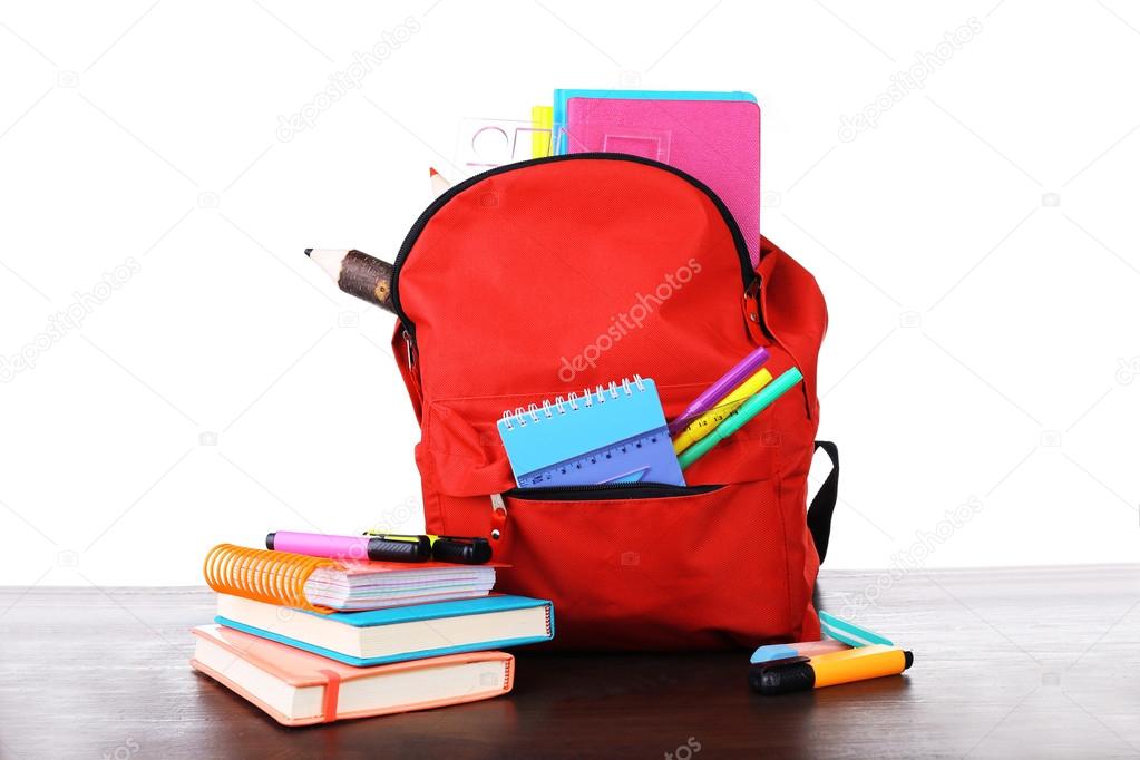 Red bag with school equipment
