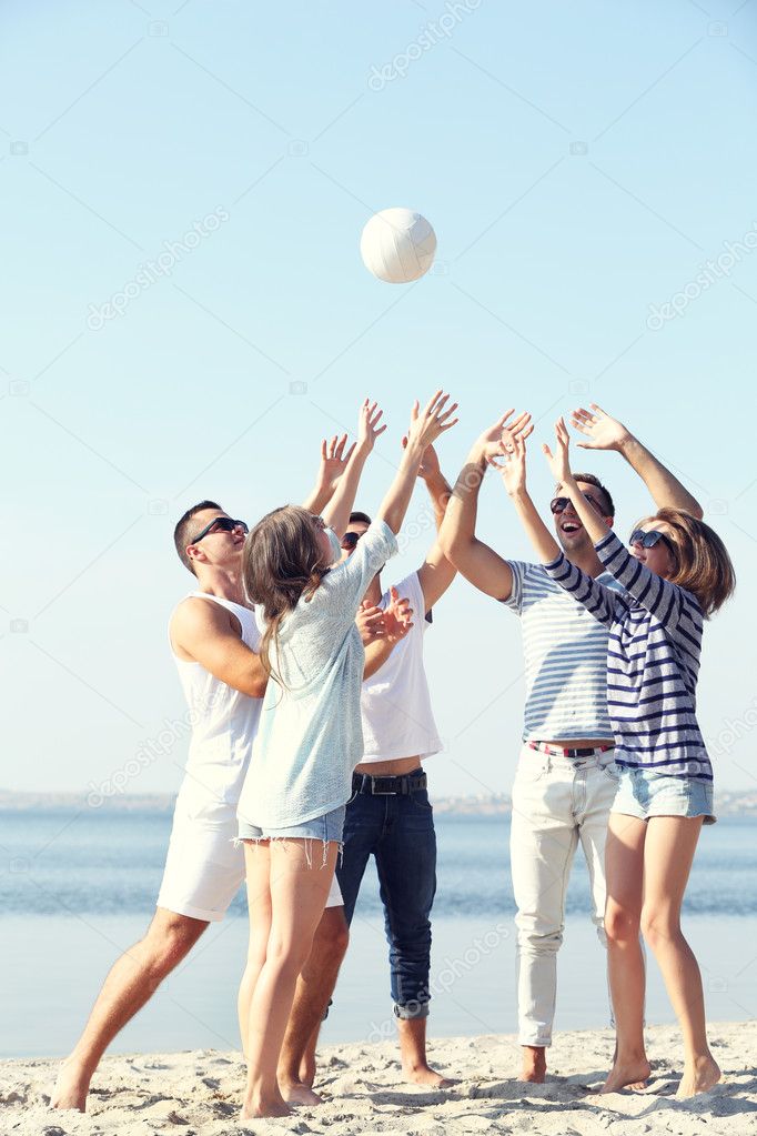 Young people playing with ball 