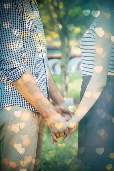 Loving couple holding hands — Stock Photo, Image