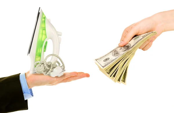 Iron and money on hands — Stock Photo, Image