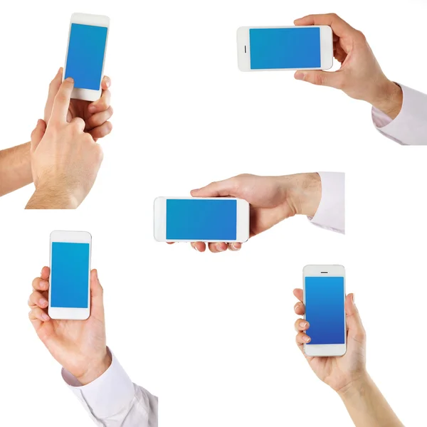 Hände, die Smartphones halten — Stockfoto
