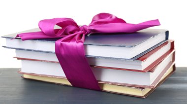 Kurdele ile kitap yığını