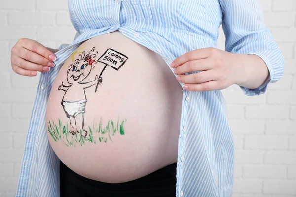 Arte corporal en el vientre de la mujer embarazada —  Fotos de Stock