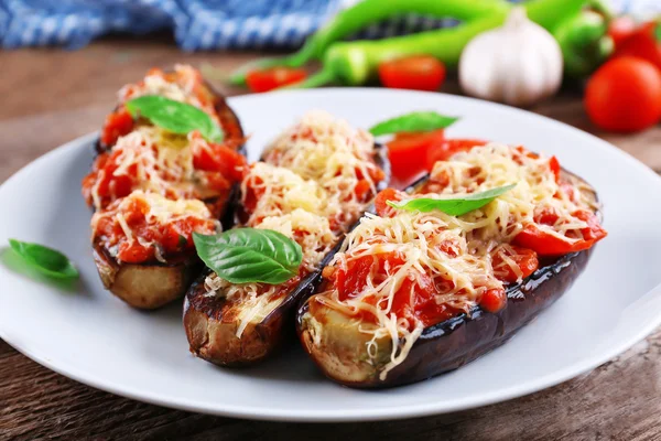 Dish of eggplant with cherry tomatoes — Stock Photo, Image