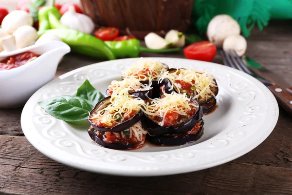 Dish of eggplant with cherry tomatoes — Stock Photo, Image