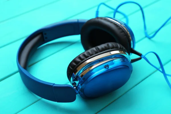 Headphones on wooden background — Stock Photo, Image