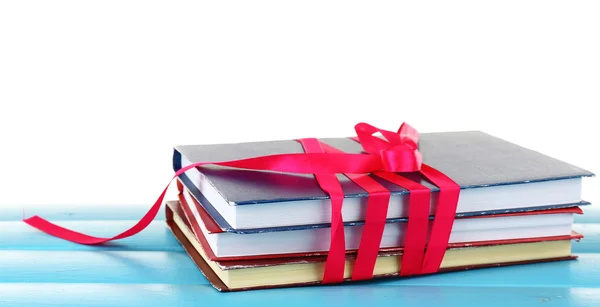 Stack of books with ribbon — Stock Photo, Image