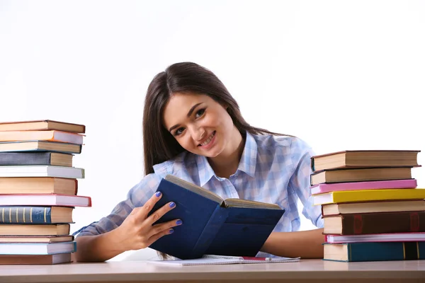 Chica joven con libros aislados — Foto de Stock