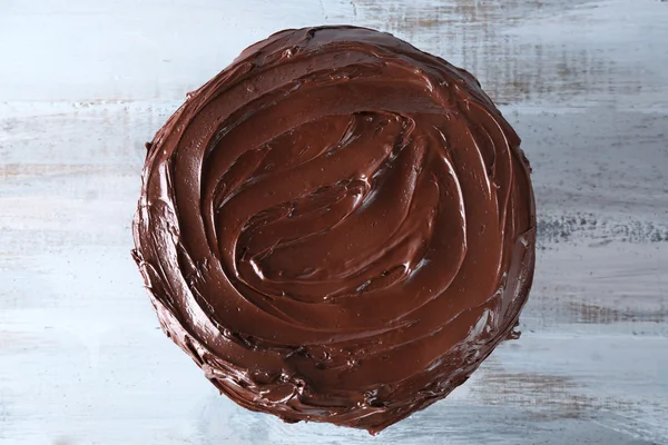 Tasty chocolate cake on light background — Stock Photo, Image