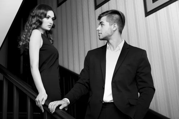 Couple in love on stairs — Stock Photo, Image