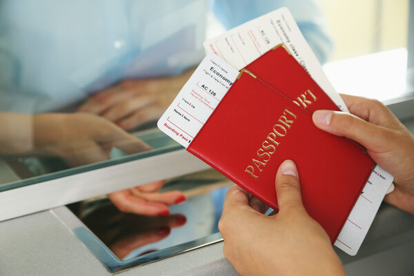 Woman buying tickets