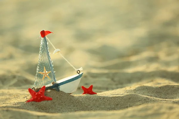 Little yacht with starfish — Stock Photo, Image