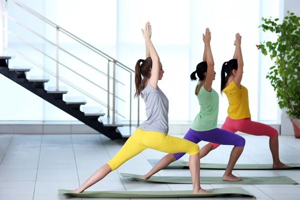 Young women practicing yoga — Stock Photo, Image