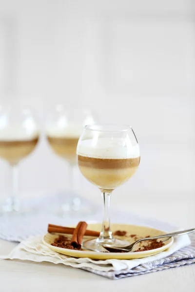 Wine glass with jelly on table, on light background — Stok Foto