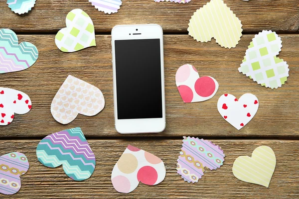 Boş ekran ve kalpleri ile akıllı telefon — Stok fotoğraf
