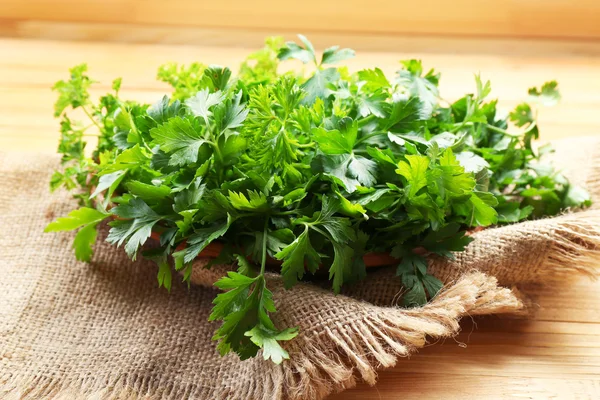 Fresh parsley on napkin — Stock Photo, Image