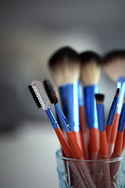 Cosmetic brushes in glass — Stock Photo, Image