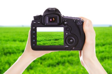 Fotoğrafçı ile iş yerinde fotoğraf makinesi
