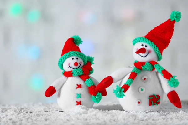 Cute snowmen on Christmas background — Stock Photo, Image