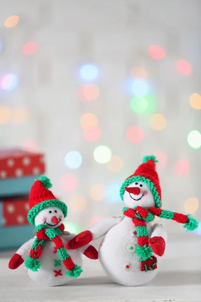 Cute snowmen on Christmas background — Stock Photo, Image