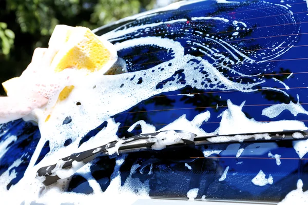 Hand washing car window — Stock Photo, Image