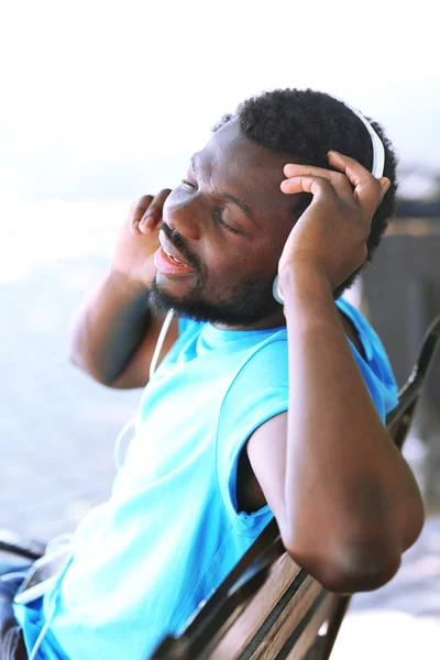 African American man listening music — Stock Photo, Image