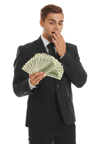 Homem elegante em terno segurando dinheiro — Fotografia de Stock