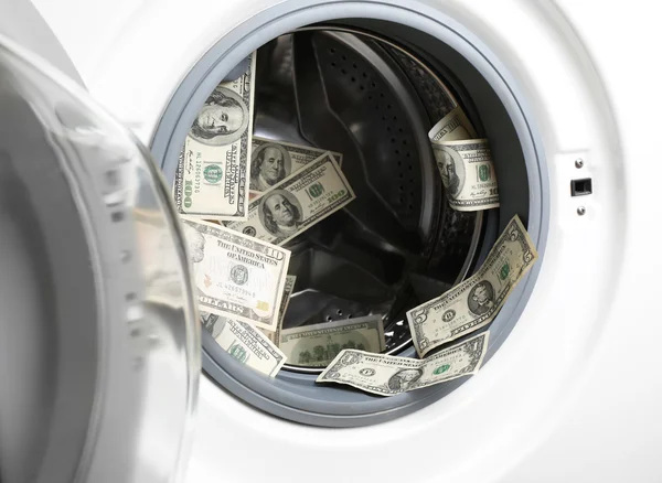 Geld in de wasmachine — Stockfoto