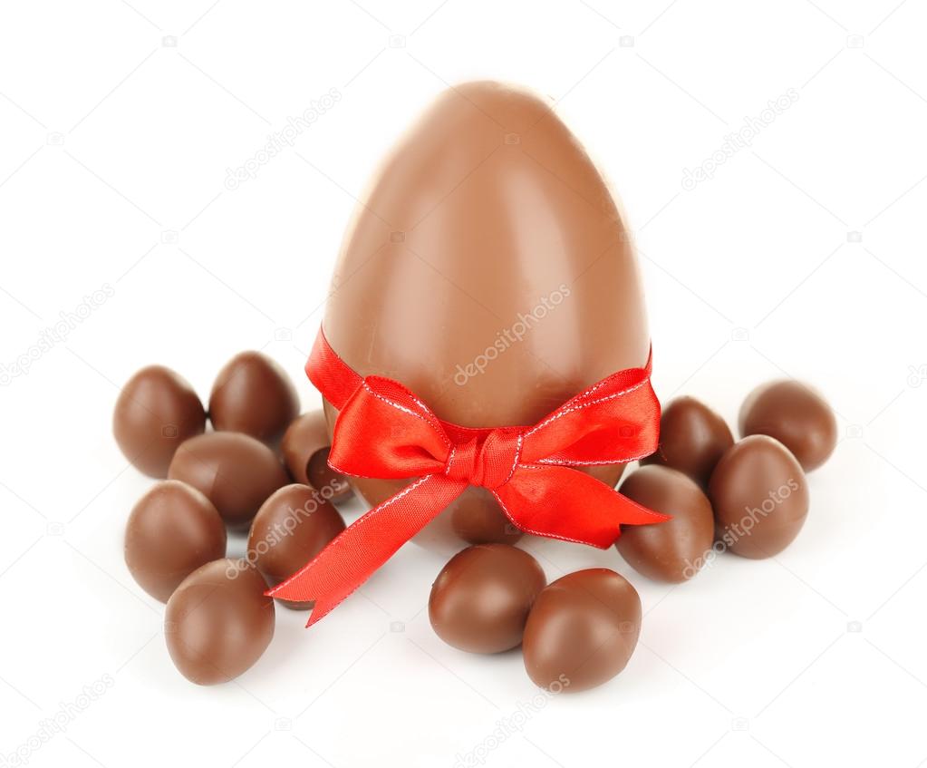One big and small chocolate Easter eggs isolated on white