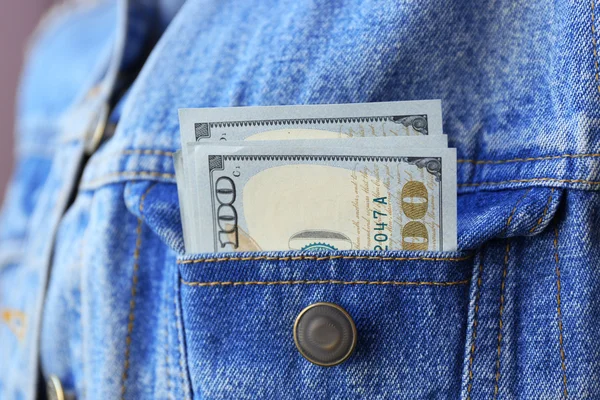 Dollar banknotes in jeans — Stock Photo, Image