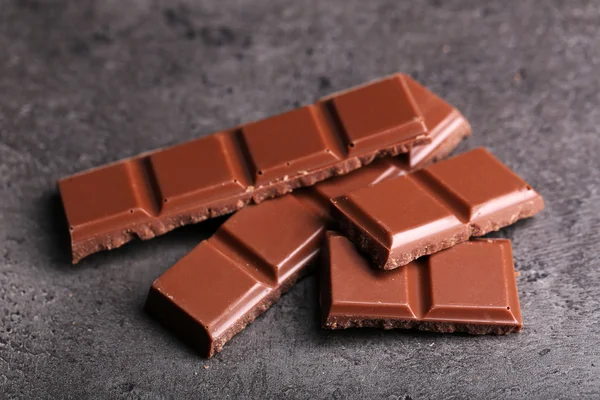 Milk chocolate pieces — Stock Photo, Image