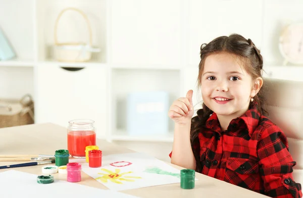 Cute little girl painting picture Stock Photo