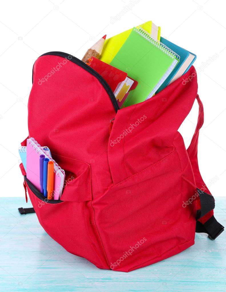 Red bag with school equipment