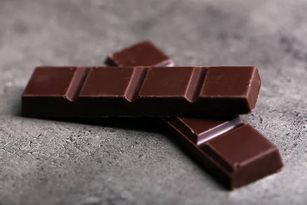Peças de chocolate escuro — Fotografia de Stock