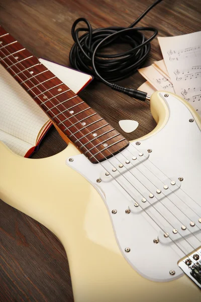 Electric guitar with musical notes — Stock Photo, Image