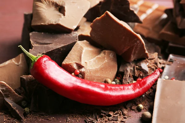 Black chocolate pieces with pepper — Stock Photo, Image