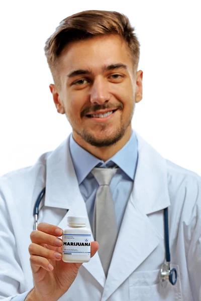 Доктор держит бутылку — стоковое фото