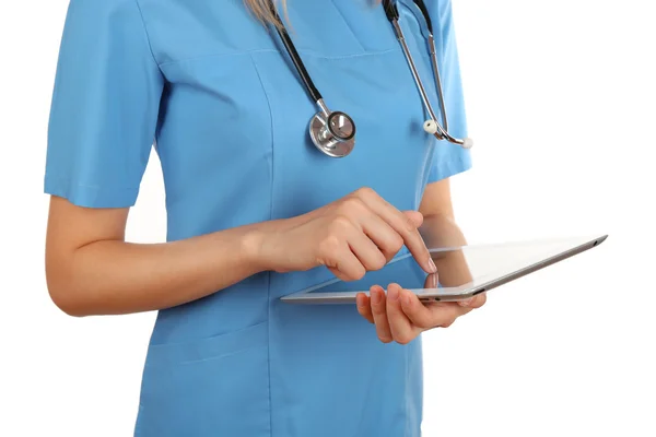 Female doctor working on digital tablet isolated on white — Stock Photo, Image