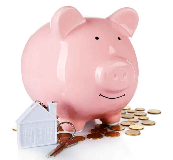 Piggy bank style money box with key — Stock Photo, Image