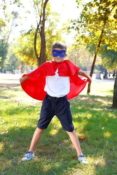 Boy dressed as superhero