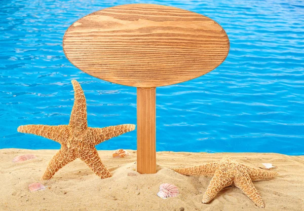 Cartello in legno con sabbia — Foto Stock