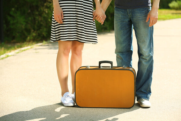 Young couple with vintage suitcase