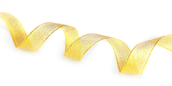 Golden curly ribbon — Stock Photo, Image