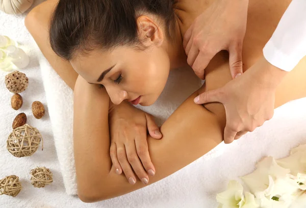 Young woman on massage table — Stock Photo, Image