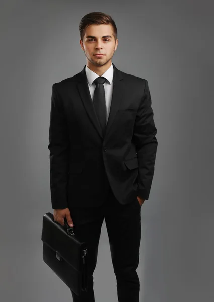 Elegant man in suit with briefcase — Stock Photo, Image