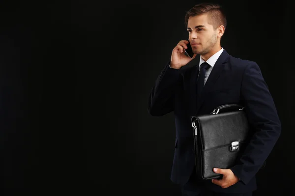 Elegant man in suit with briefcase — Stock Photo, Image