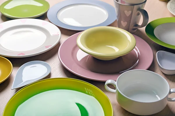 Set of different plates on the table — Stock Photo, Image