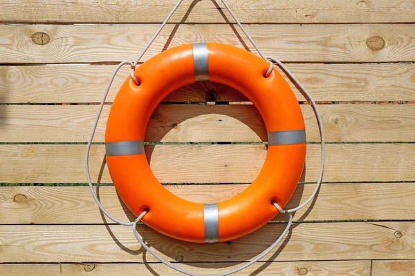 Orange life buoy — Stock Photo, Image